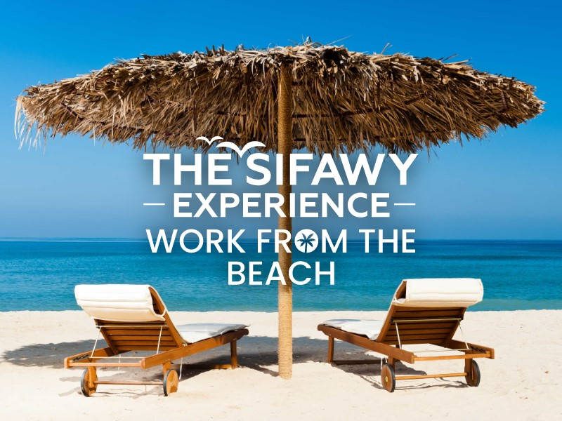 Sifawy Hotel Experience on the beach with 2 seating desks in the morning