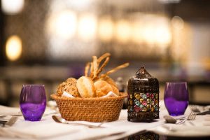 bread basket in elegant diner setting at Sifawy hotel restaurant