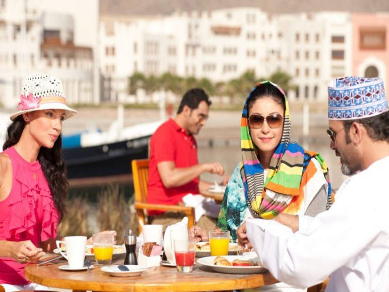A group of friends having brunch at Sifawy hotel Oman