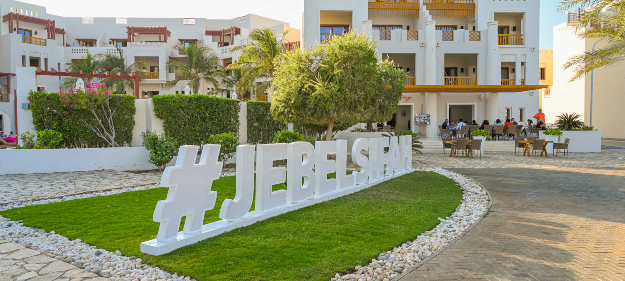 view of breeze restaurant and hotel sifawy in jebel sifah resort