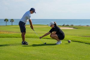 2 Guests Enjoying Playing Golf at Sifawy Hotel
